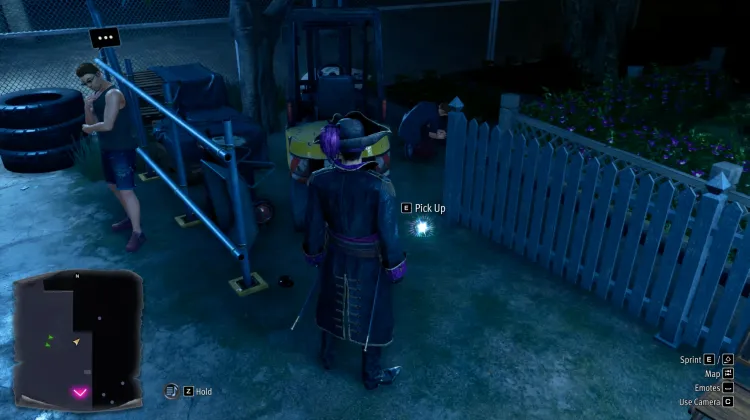 In between the wood fences and the forklift